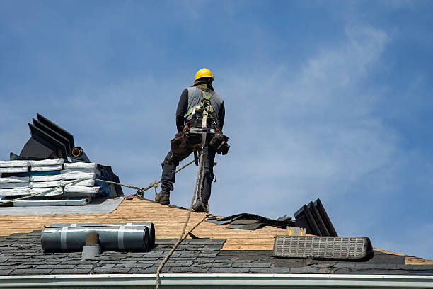 Professional Roofing technician working in West Hempstead, NY